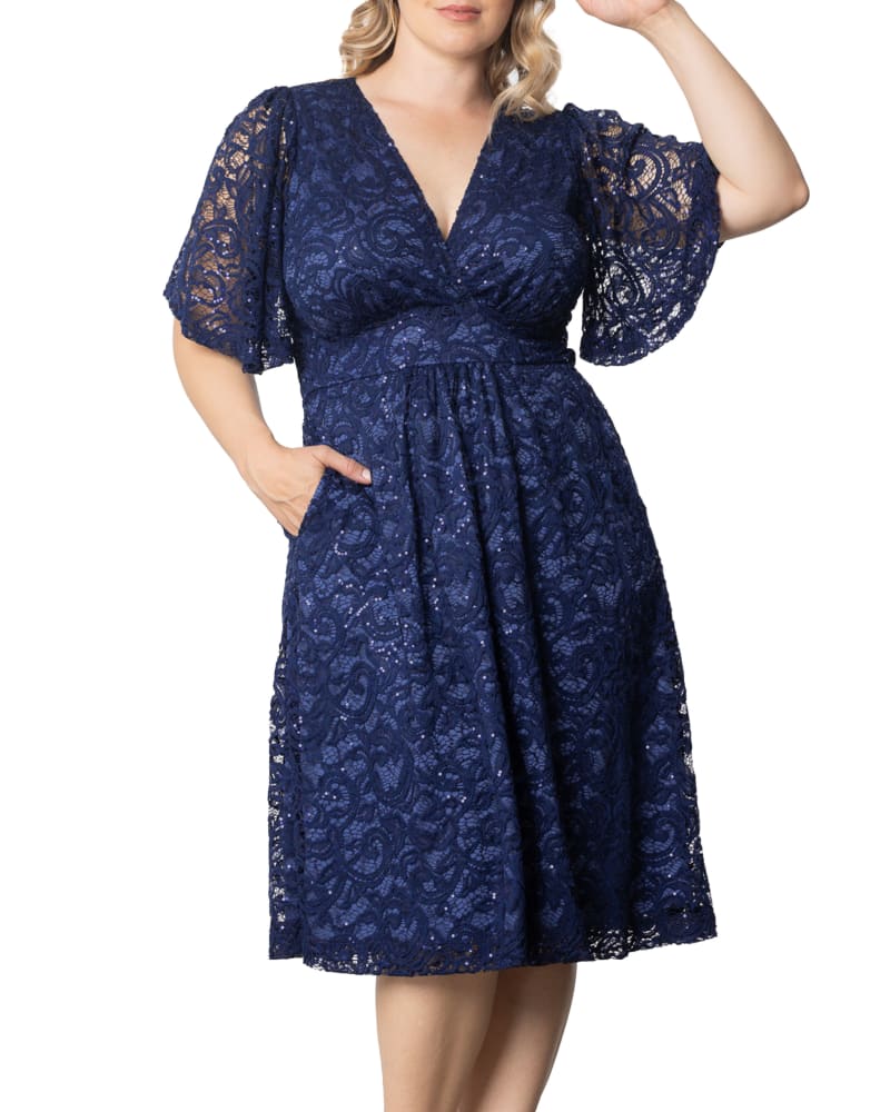 Front of a model wearing a size 5X Starry Sequined Lace Cocktail Dress in NOCTURNAL NAVY by Kiyonna. | dia_product_style_image_id:353116